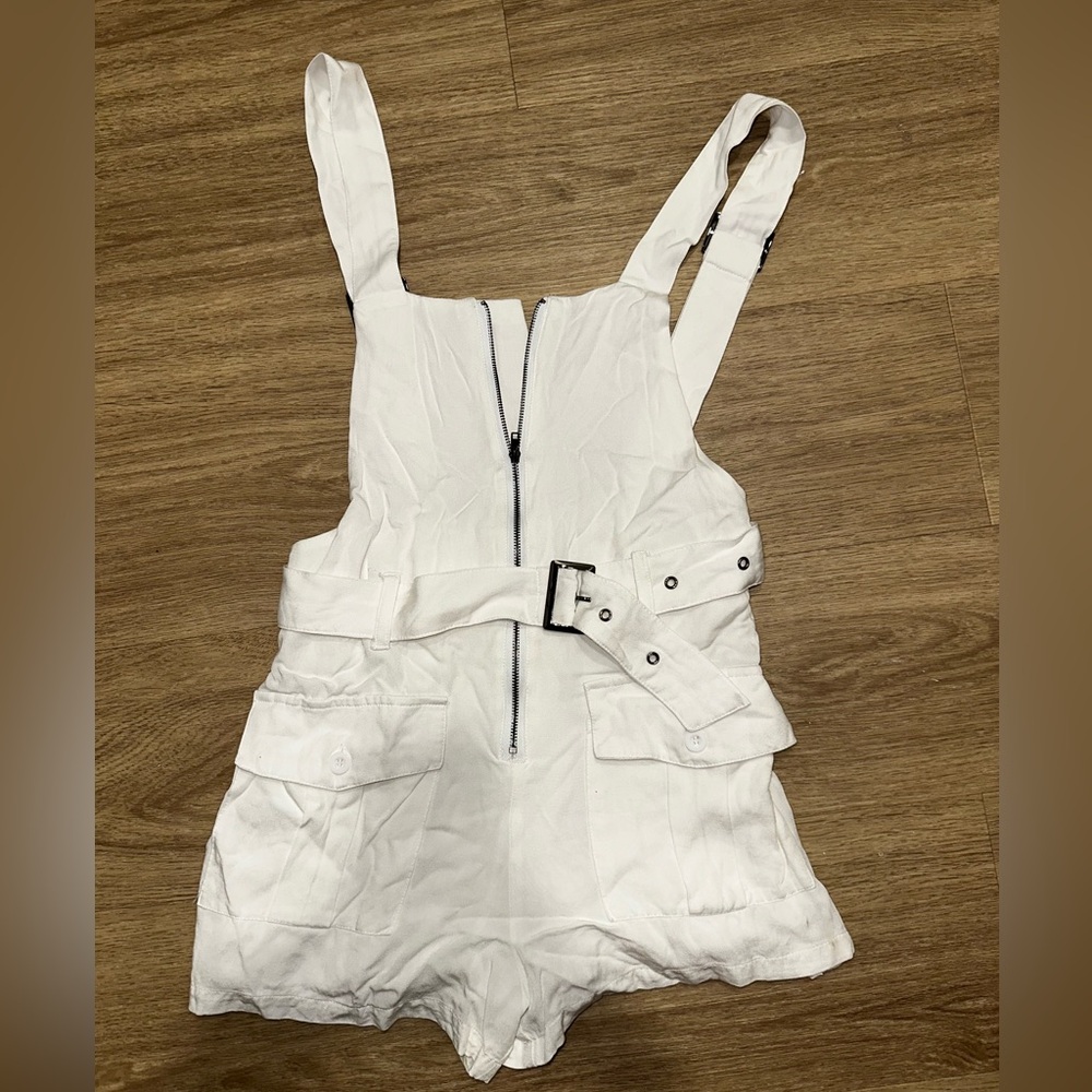 white sexy romper open back, size xs/0 from LF